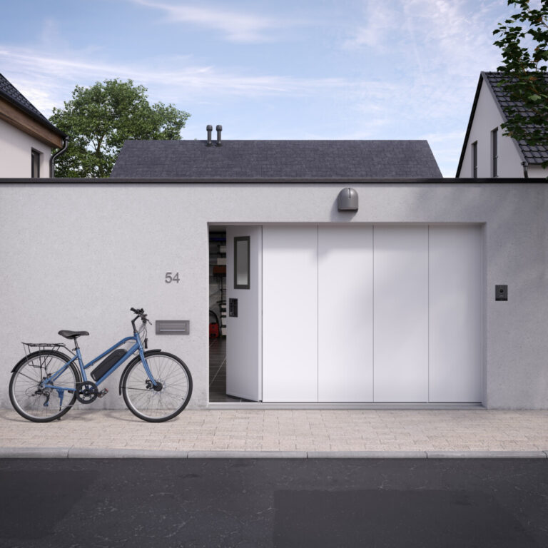 Porte de garage sectionnelle latérale RAL 9016 avec accès piéton à Nancy